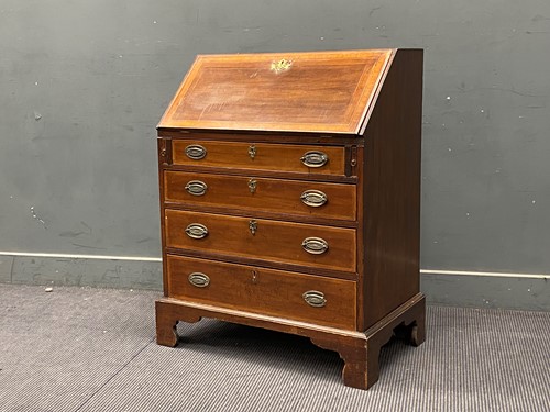 Lot 330 - An Edwardian mahogany and cross-banded bureau...