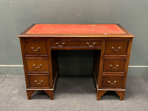 Lot 565 - A George III style reproduction mahogany desk...