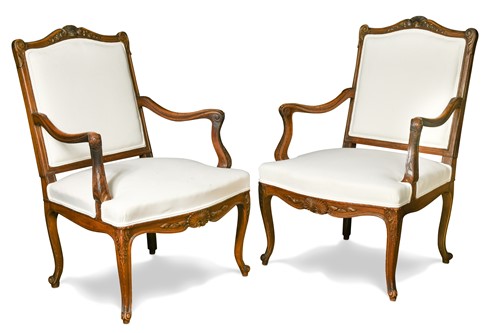 Lot 548 - A pair of French walnut elbow chairs, late 19th century
