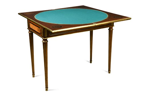 Lot 565 - A gilt brass mounted fruitwood veneered card table, early 19th century