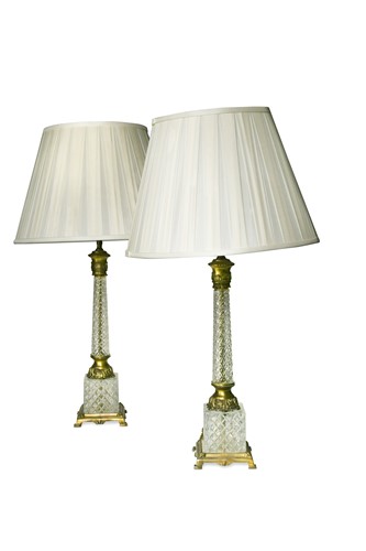 Lot 392 - A pair of moulded glass and gilt metal table lamps, modern