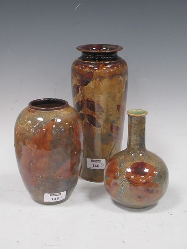 Lot 146 - Three Royal Doulton stoneware vases, circa...