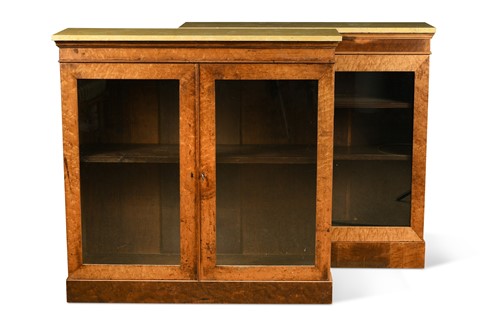 Lot 507 - A pair of Victorian birdseye maple bookcases with marble tops