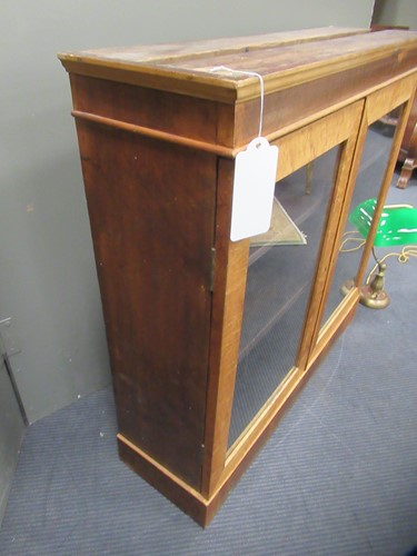 Lot 507 - A pair of Victorian birdseye maple bookcases with marble tops