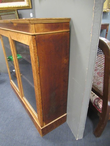Lot 507 - A pair of Victorian birdseye maple bookcases with marble tops