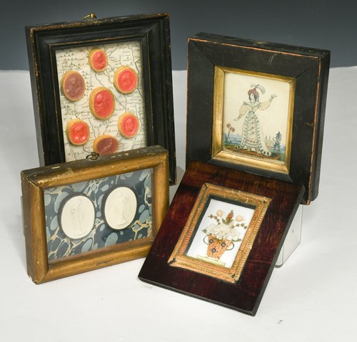 Lot 245 - Two small frames of classical plaster cameos,...