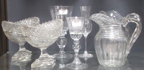 Lot 81 - Two 19th century cut glass jugs, together with...