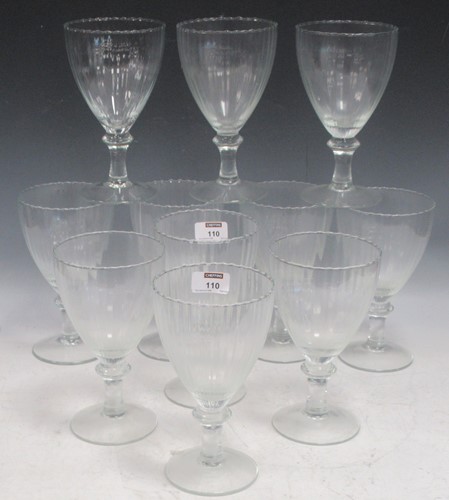 Lot 110 - A set of eleven 20th century wine glasses, the...