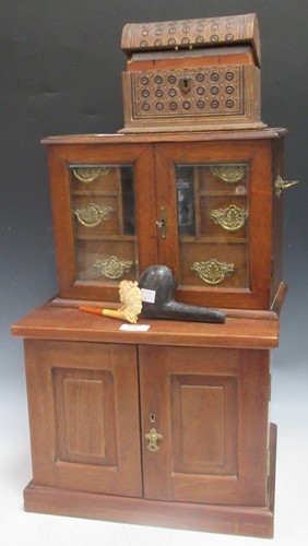 Lot 216 - An early 20th century oak smoker's cabinet...