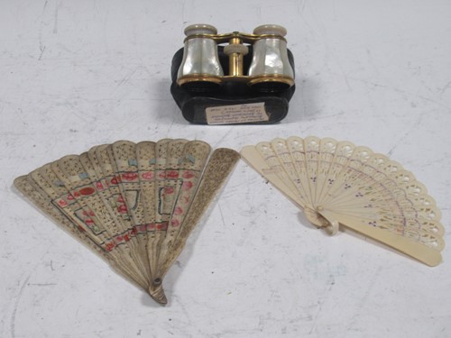 Lot 320 - Two fans and a pair of opera glasses