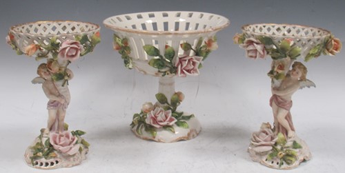 Lot 9 - A pair of Plaue on Havel figural tazza and...