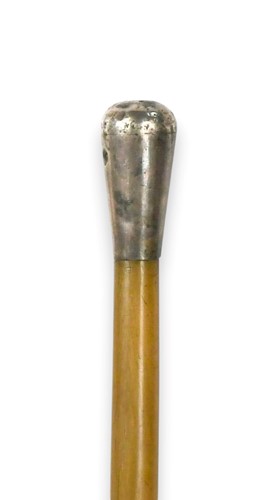Lot 64 - A silver coloured metal mounted rhino horn swagger stick, circa 1910