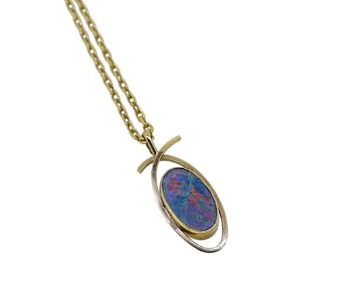 Lot 96 - An opal doublet pendant