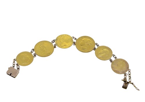 Lot 109 - A bracelet featuring six coins