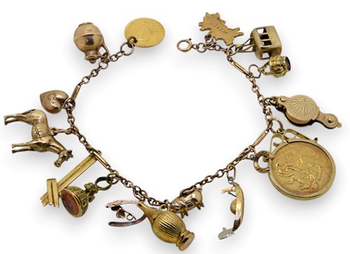 Lot 107 - A charm bracelet