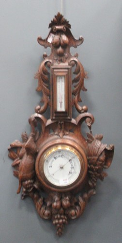 Lot 136 - Aneroid Barometer and thermometer within Black...