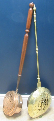Lot 211 - A 17th century Dutch brass warming pan with...