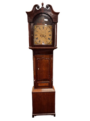 Lot 142 - A provincial mahogany and oak long case clock,...