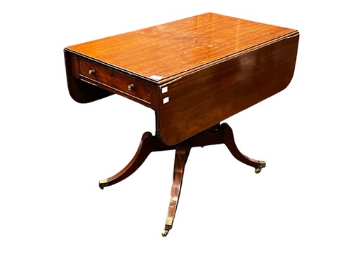 Lot 570 - A Regency mahogany Pembroke table, on four...