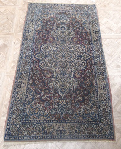 Lot 777 - A early 20th century Tabriz wool rug with...