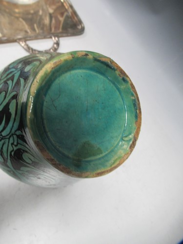 Lot 5 - A Qajar vase of ovoid form, the turquoise...