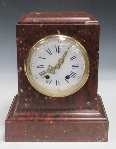 Lot 186 - A 19th century rouge marble mantle clock...