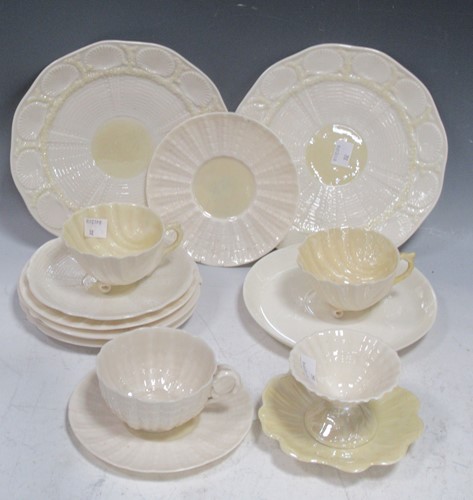 Lot 142 - Eleven Belleek saucers of seashell form, three...