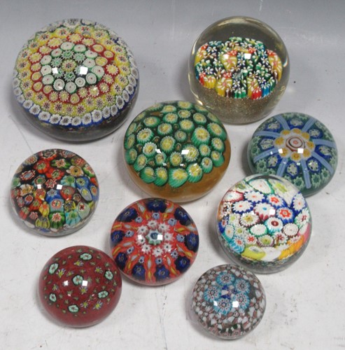 Lot 44 - Eight millefiori glass paperweights, mostly...