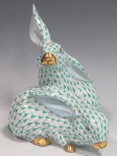 Lot 180 - A Herend group of two rabbits in green scale...