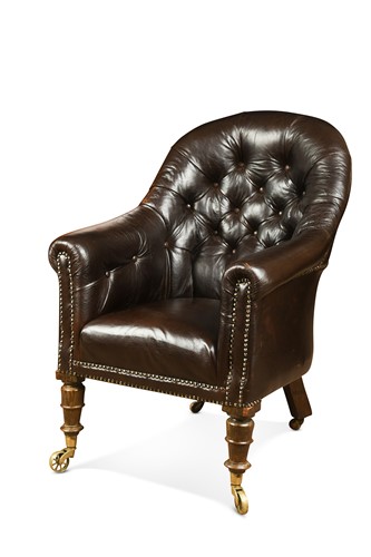 Lot 522 - A Victorian leather button back library armchair