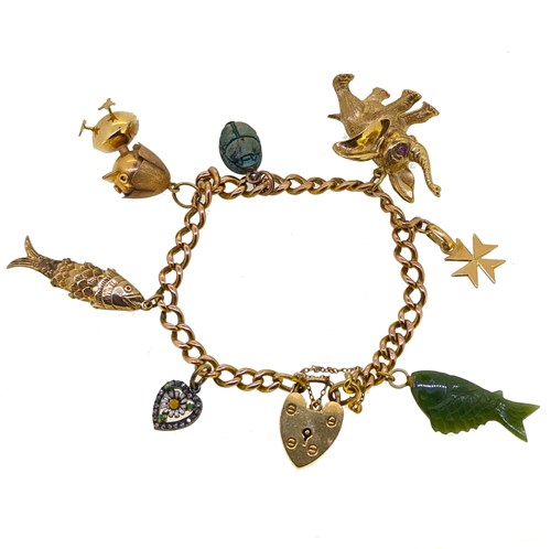 Lot 105 - A charm bracelet
