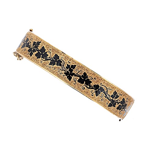 Lot 18 - A Victorian enamelled bangle