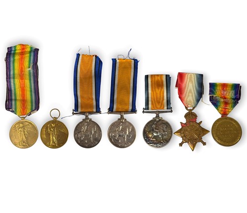 Lot 190 - A World War One medal trio and two pairs
