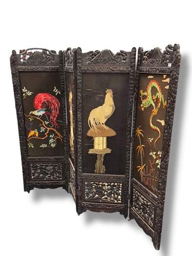 Lot 823 - A Japanese four-fold screen with scenes of...