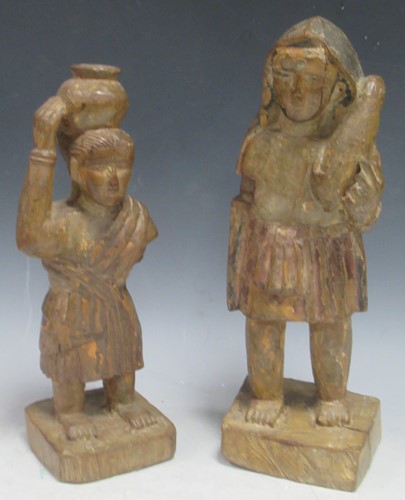 Lot 164 - A pair of Colonial carved wood figures, late...