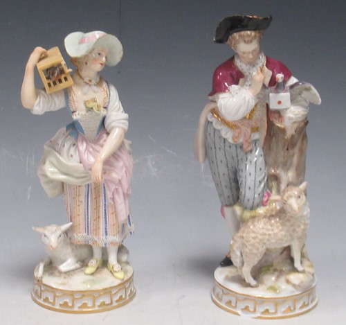 Lot 21 - A pair of Meissen figures of a lady and...