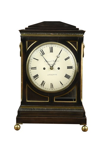 Lot 340 - A Regency ebonised bracket clock