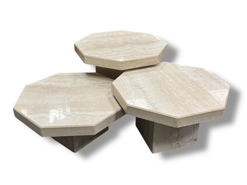 Lot 793 - A set of three graduating travertine...