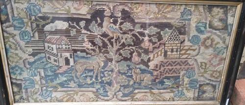 Lot 659 - An 18th century needlework fragment panel...
