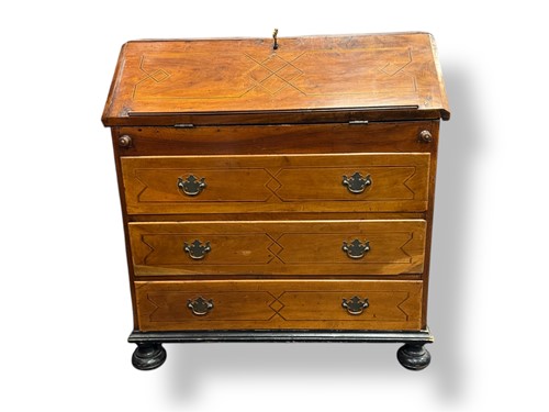 Lot 557 - A Continental late 18th century walnut and...
