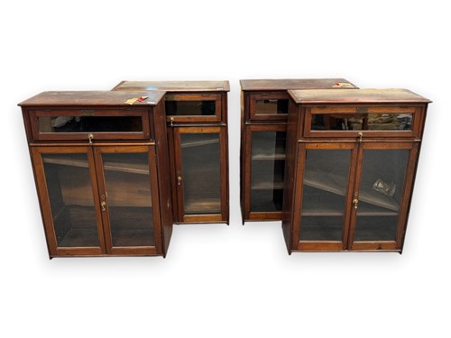 Lot 423 - A set of four glazed mahogany bookcases, late 19th century