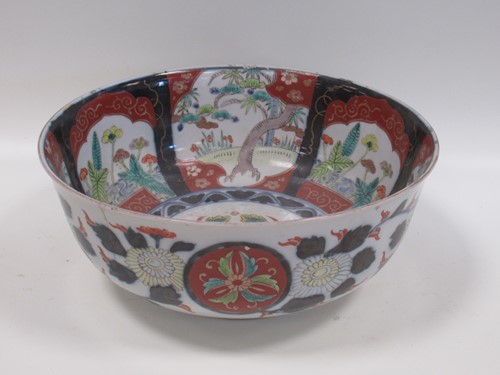 Lot 11 - A large Japanese bowl decorated with...