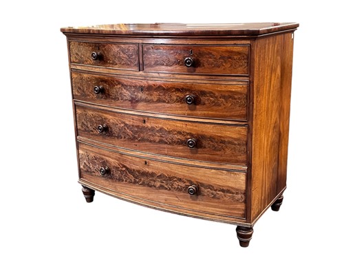 Lot 655 - A 19th century mahogany bow front chest of...