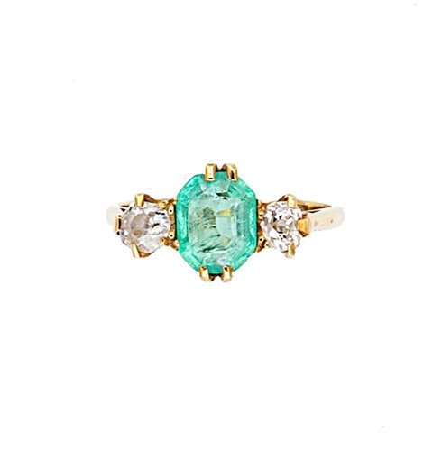 Lot 6 - A three stone emerald and diamond ring