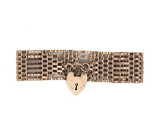Lot 14 - A late 20th century 9ct gold gate bracelet