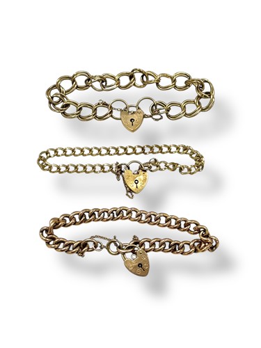 Lot 271 - Three hallmarked 9ct gold padlock bracelets,...