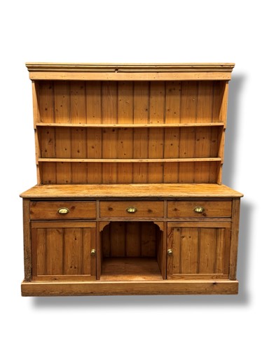 Lot 523 - A Victorian and later pine dresser, the...