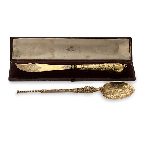Lot 287 - A cased and decorative silver gilt knife, and...