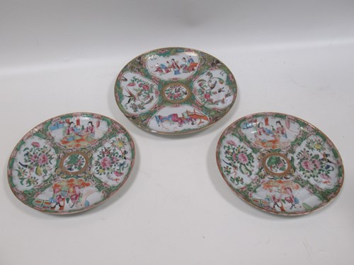Lot 22 - A group of three Canton famille rose plates,...
