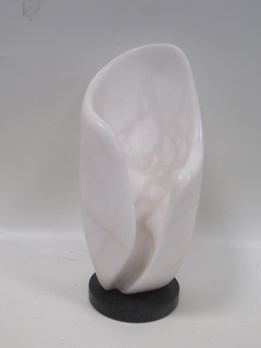 Lot 208 - A modern shell shaped alabaster sculpture, on...